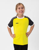 JAKO Shirt Iconic KM - zachtgeel/zwart
