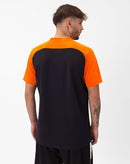 JAKO Polo Iconic - zwart/fluo oranje