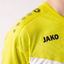 JAKO Polo Iconic - zwart/zachtgeel